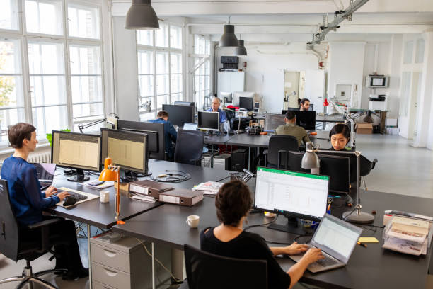 Desk with notebooks, markers, and planning materials